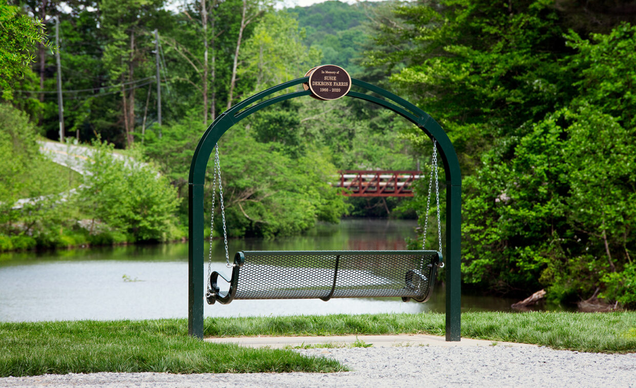 Image of a bench overlooking a lake.