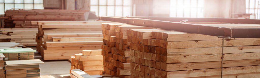 Wood planks and bricks for house building storing at construction site